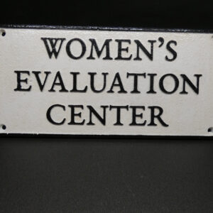 Women’s Evaluation Centre Cast Iron Sign
