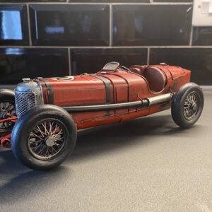 Red Vintage Boat Tail Sports Car